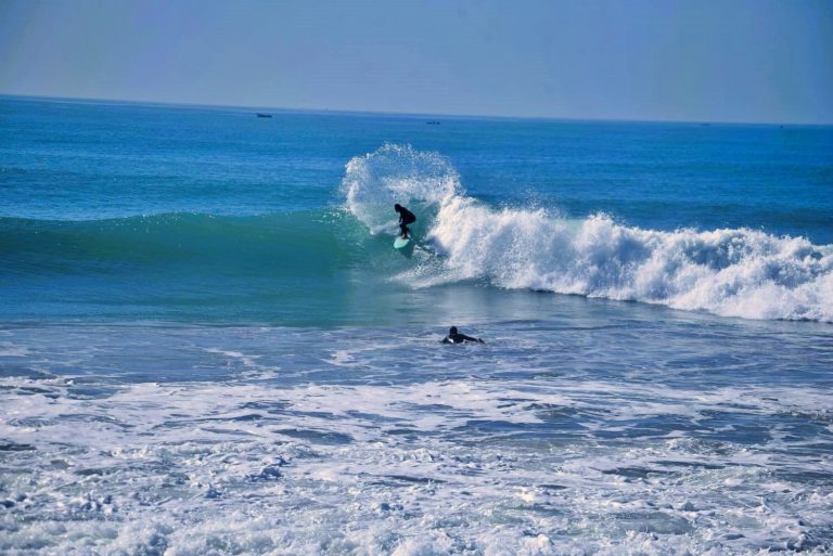 Surfers at Anchor Point in Morocco
