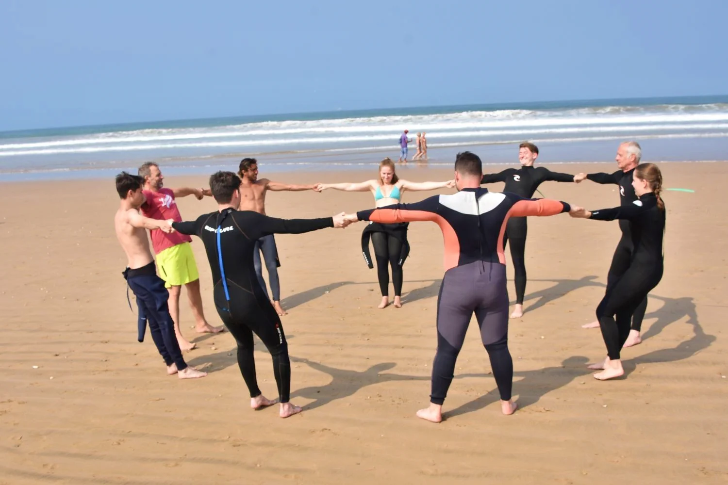 Surf students during the warm-up before the surf course