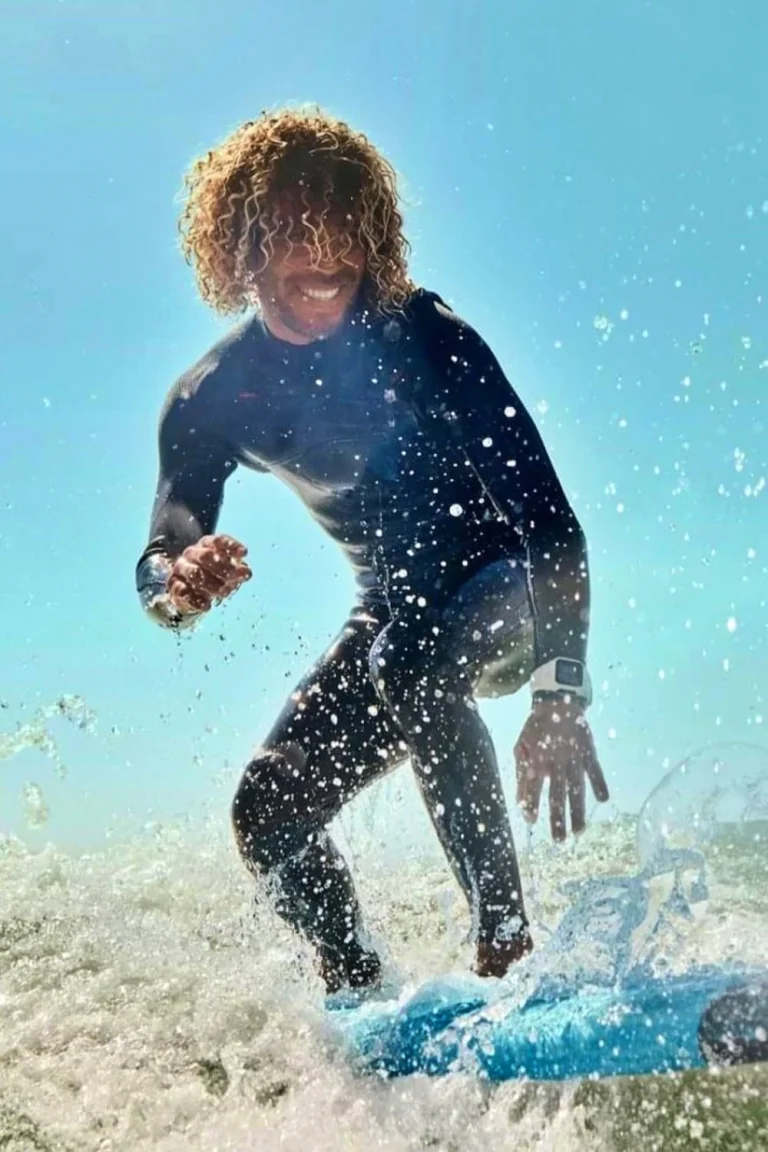 Ismail alias Poki, the founder of Poki Surf Morocco in the waves of Agadir