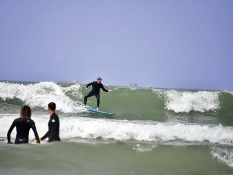 Intermediate surfer on the beach at Agadir
