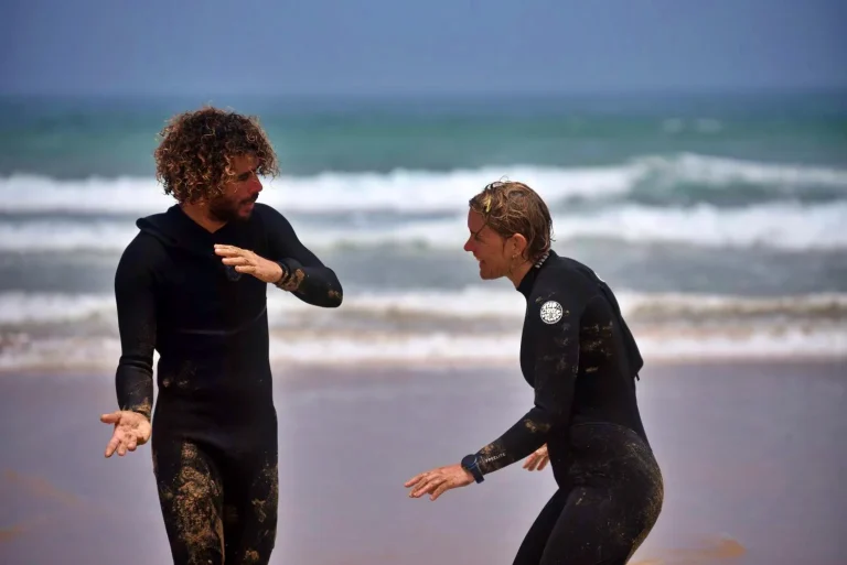 Surf instructor gives practical advice on turning the surfboard on the beach