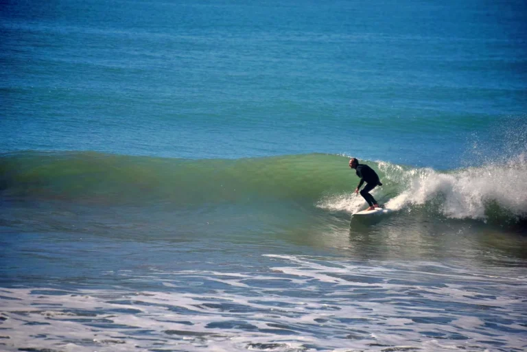 Surfer rides man-high waves at Anchor Point in Taghazout